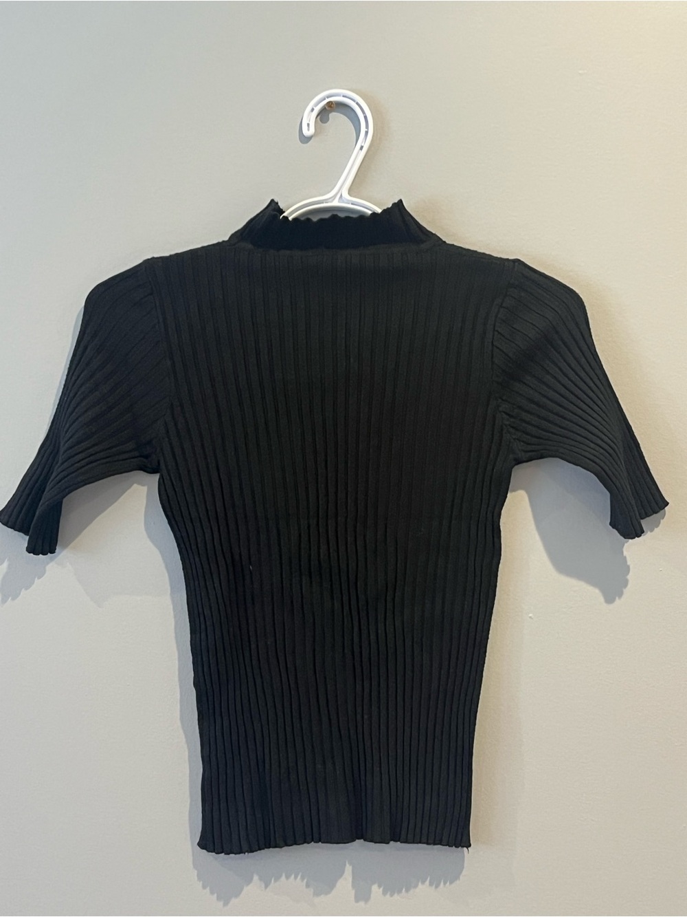 chic scandi aesthetic black ribbed mock neck top